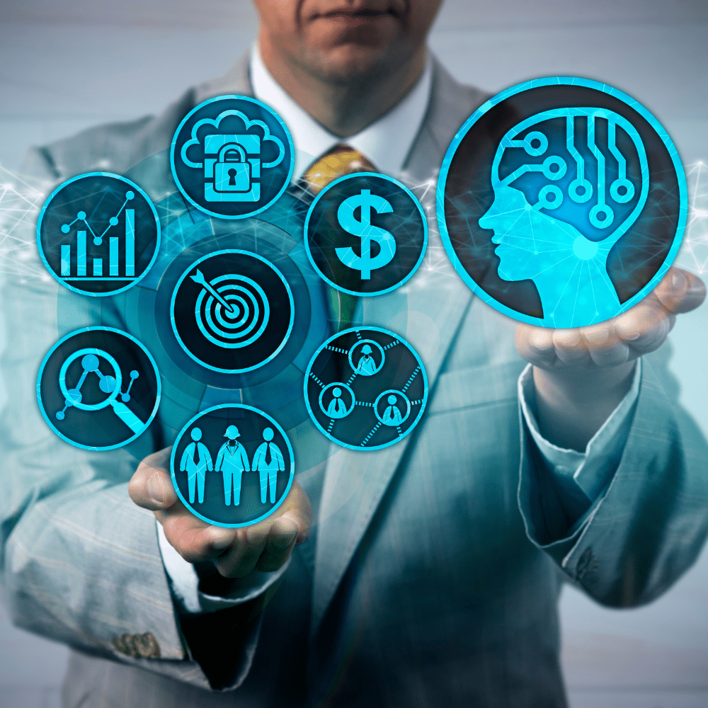 A man in a suit holding out his hand with icons of business and finance.