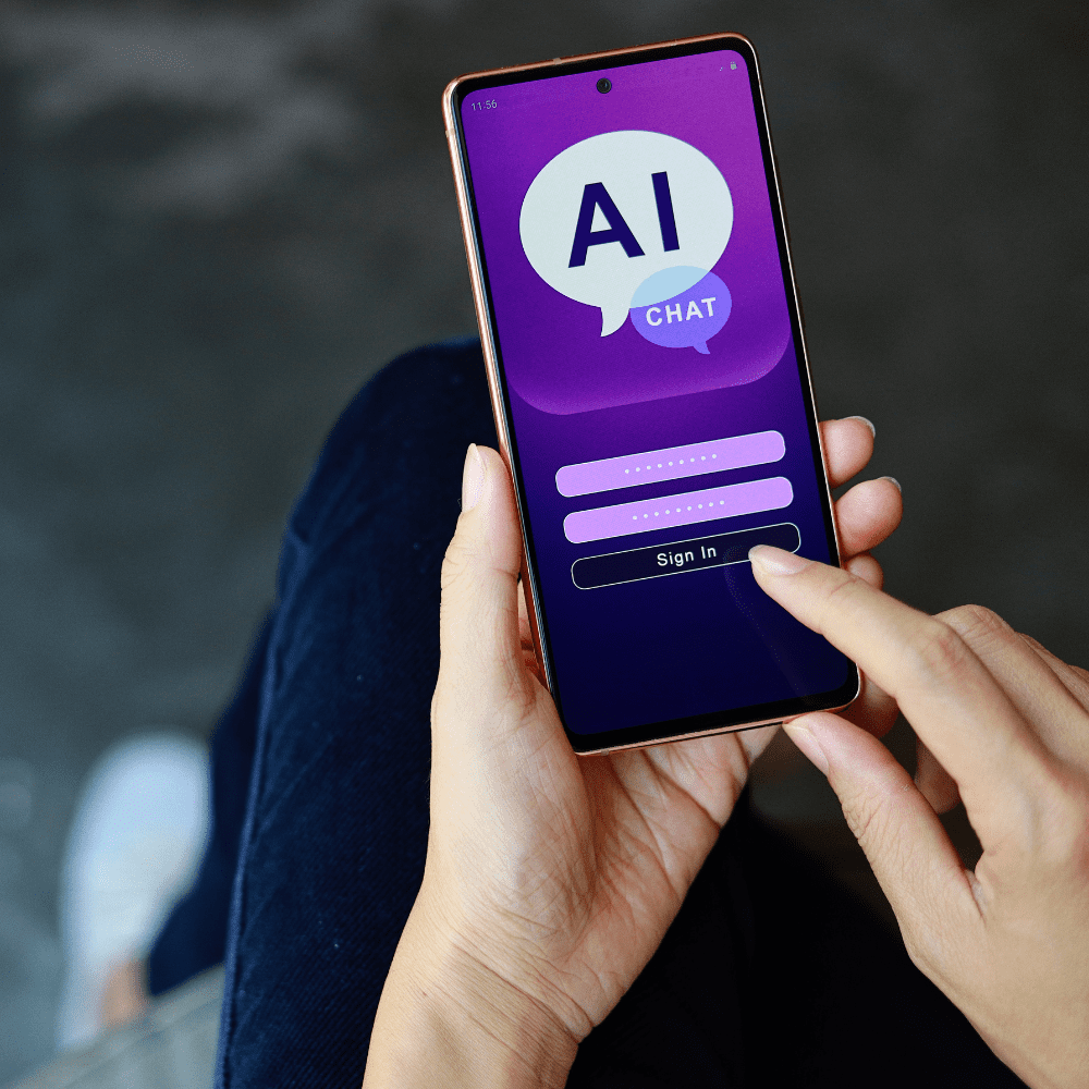 A person holding a phone with an ai message on the screen.