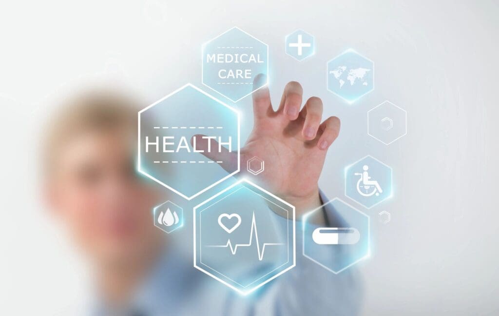 Blurred person using a touchscreen interface with health and medical care icons floating in the air.