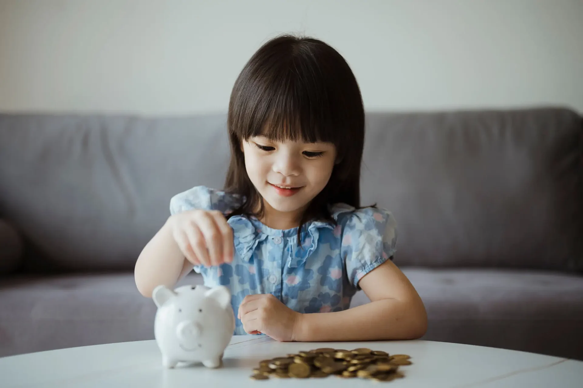 Child counting coins
