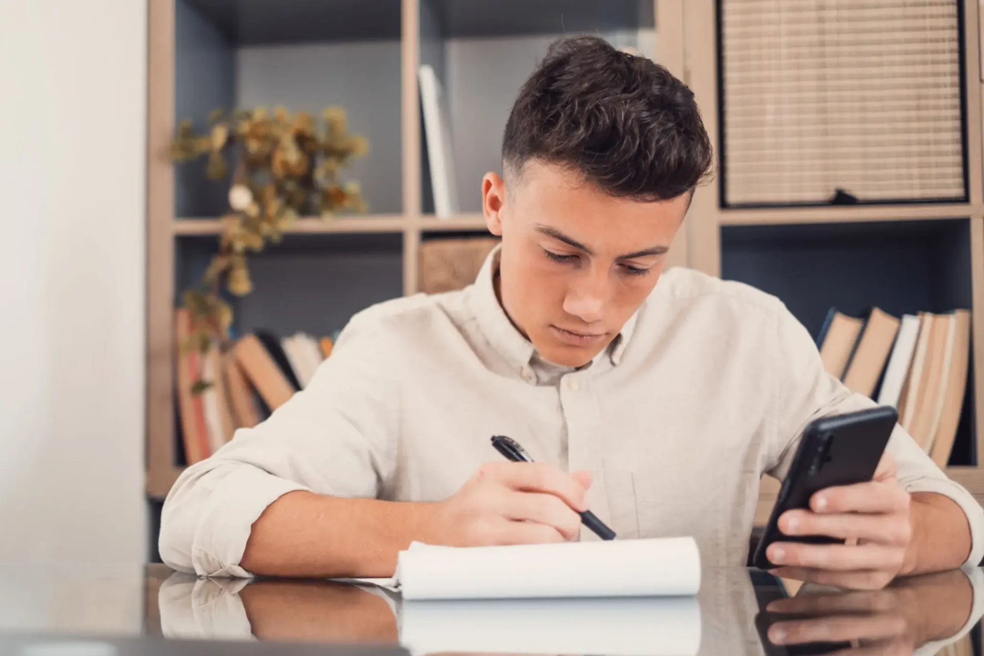 Teen reviewing a pay stub