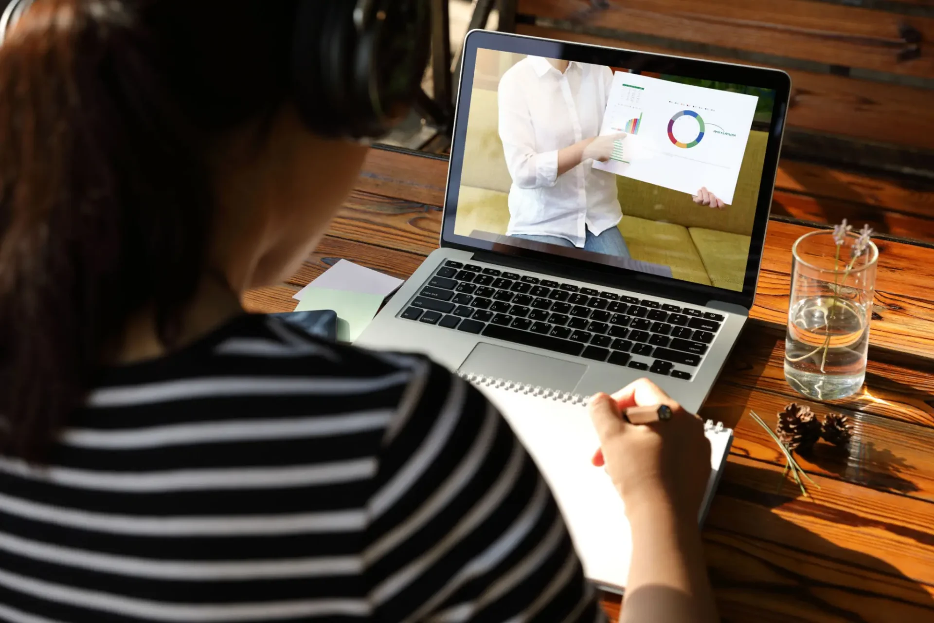 Student watching an online 
finance video lesson