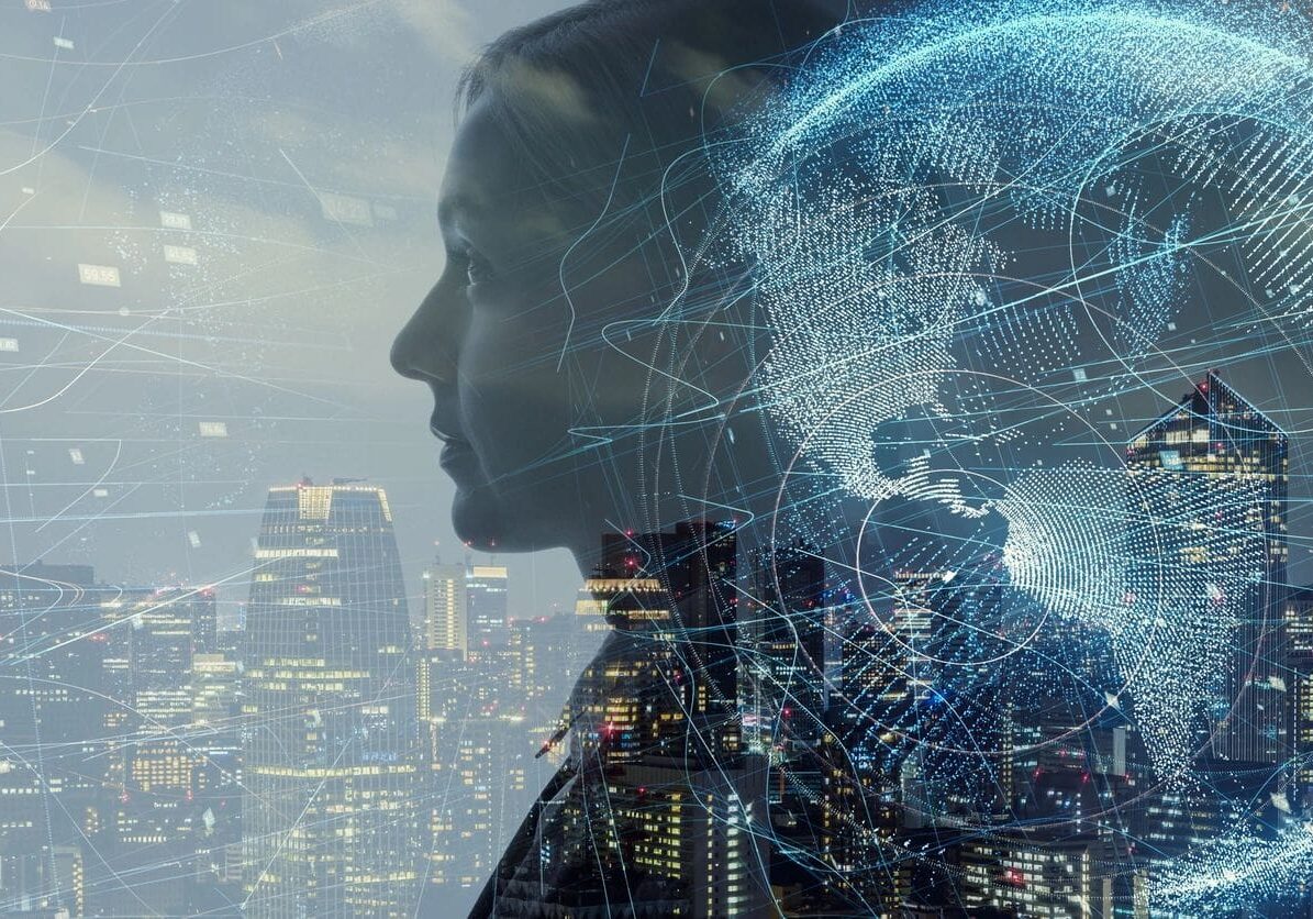 Profile of a woman overlaid with digital graphics of a brain and cityscape, symbolizing the fusion of human thought and urban technology.