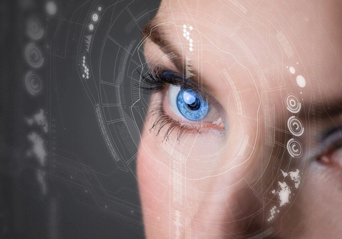 Close-up of a woman's blue eye with futuristic digital overlays and global map graphics, symbolizing advanced technology or surveillance.